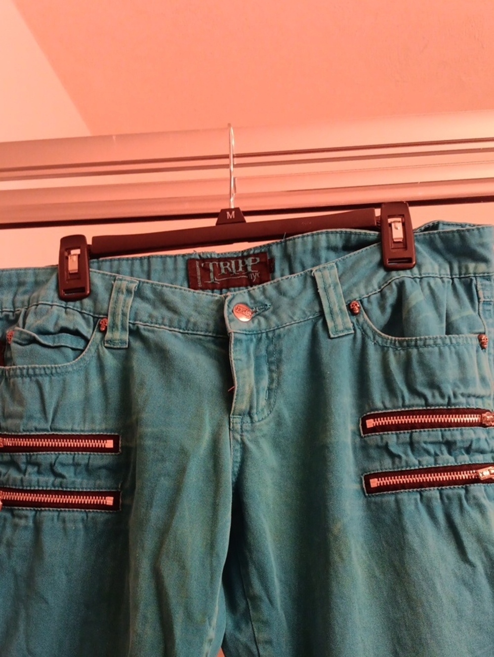 Tripp NYC turquoise cargo pants with black zipper trim